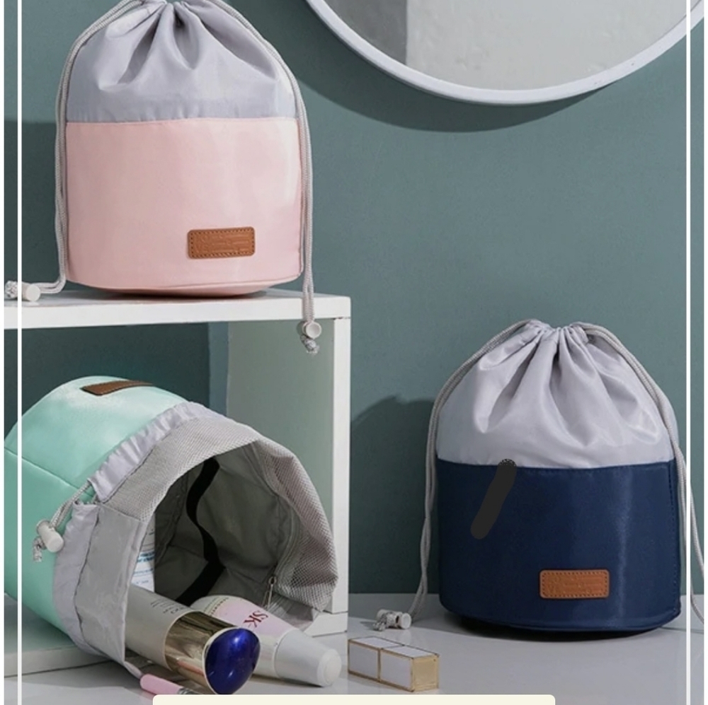 NWT Cosmetic Cinch bag . Selling Grey on Grey